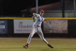 Player Makes a Run to First Base